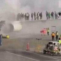 American Airlines Boeing 737 bursts into flames (VIDEOS)