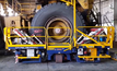 Hedweld's TH 15000 tyre handler removes tyre fitters from the direct line of fire