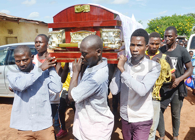 elatives carry oloobas remains ahead of his burial hoto by tuart iga