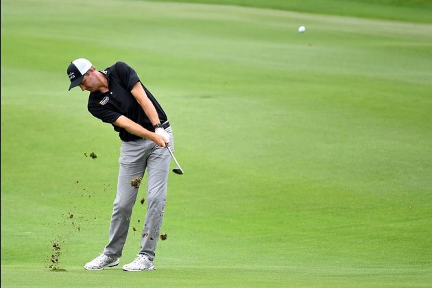 Todd maintains WGC lead, with An closing