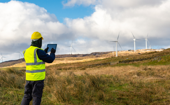 A worker examines turbines in Dumfries and Galloway | Credit: iStock