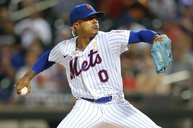 Cardinals edge Mets in 11, move into playoff position