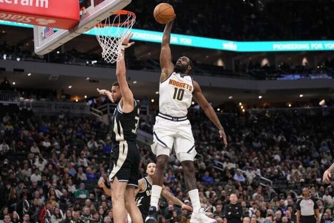 Short-handed Nuggets edge Bucks, who lose Giannis Antetokounmpo