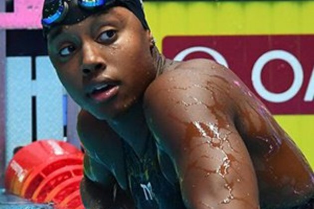 Defending champ Manuel storms to world 100m freestyle gold