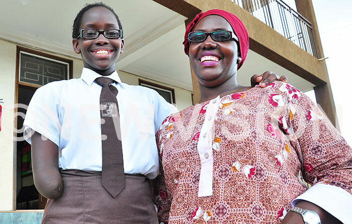  ukundakwe and her mother at school