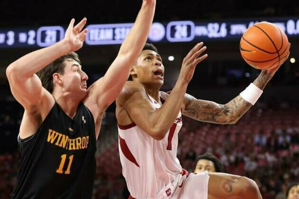 No. 21 Arkansas ends game on 6-0 run to rally past red-hot Winthrop