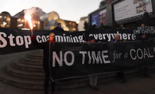 Protestors against the Whitehaven coal mine outside the Mines and Money conference in November 2023. Photo: Coal Action UK 