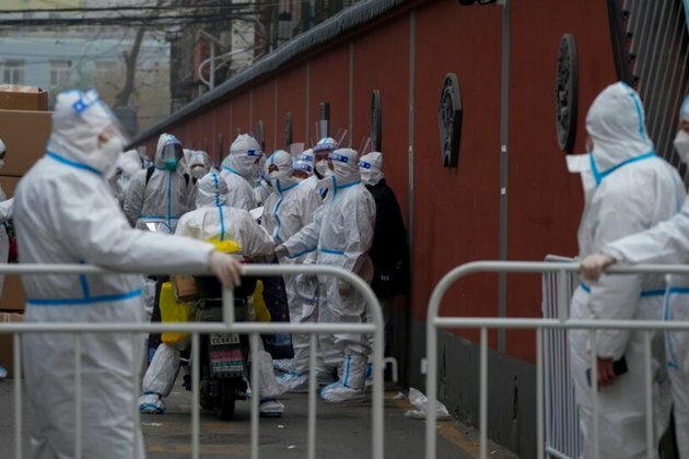 China Reports Another One-Day COVID Case Record, Tightens Curbs