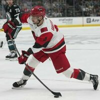 Rookie goalie wins debut as Hurricanes down Sharks
