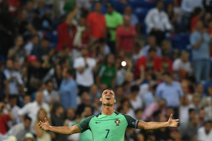  ortugals forward ristiano onaldo celebrates at the end of the uro 2016 semifinal football match between ortugal and ales at the arc lympique yonnais stadium in cinesharpieu near yon on uly 6 2016     rancisco 