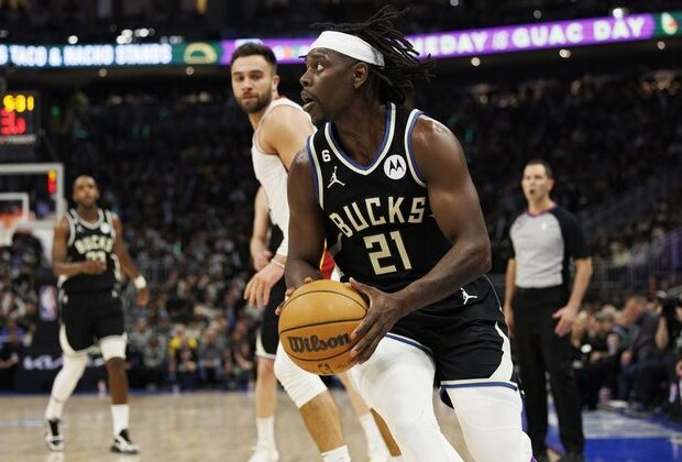 Celtics' title odds increase with acquisition of G Jrue Holiday