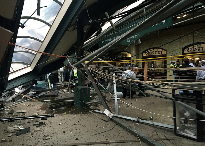 he roof collapse after a  ransit train crashed in to the platform at the oboken erminal  hoto