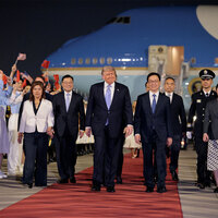 President Trump arrives in China for high-stakes summit with President Xi Jingping