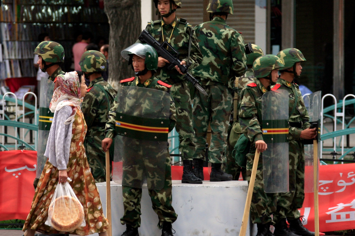 China's Xinjiang tourism push criticised as region faces mass surveillance, detentions