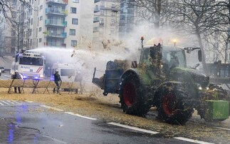 Farmer protests: water cannons and riot police employed as Belgian farmers surround EU buildings