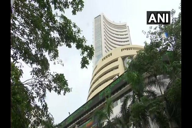 Stocks trade volatile amid weak global cues, Yes Bank tumbles by 8 pc