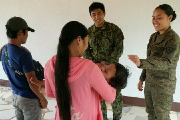 NPA couple surrenders, reunites with son in NegOr
