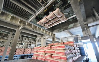 Cement packs sit in a warehouse | Credit: YCC