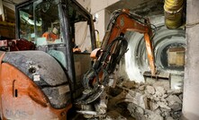  Excavator at work during the construction of a cross passage for the Chiltern tunnel