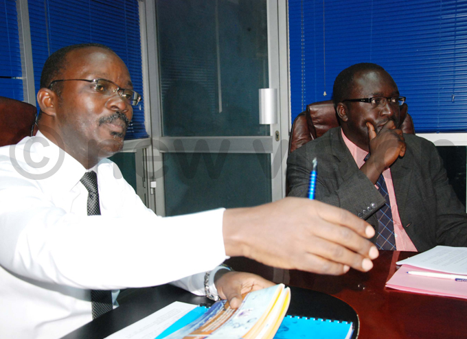 s ng r liver ugisha and am pedel addressing journalists at the companys offices in ampala hoto by bou isige