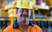 Sean Milful, general manager at BMA's Goonyella Riverside coal mine, in front of one of the new autonomous trucks