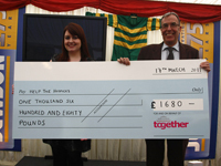 Builders' Merchant has a flutter for charity   