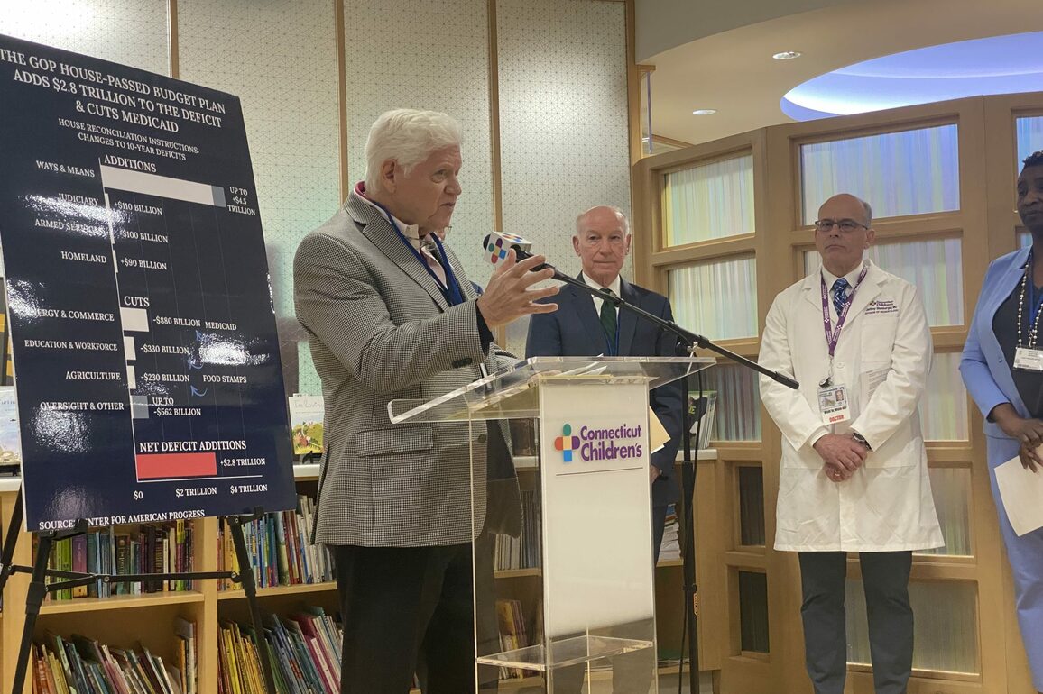 John Larson suffers brief speech pause at CT press conference