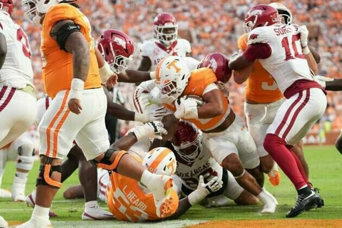 No. 12 Tennessee surges ahead in third quarter, holds off Arkansas
