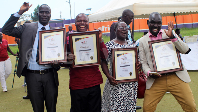  ome of the irst lass degree holders celebrating as they display their awards during the commencement lecture 
