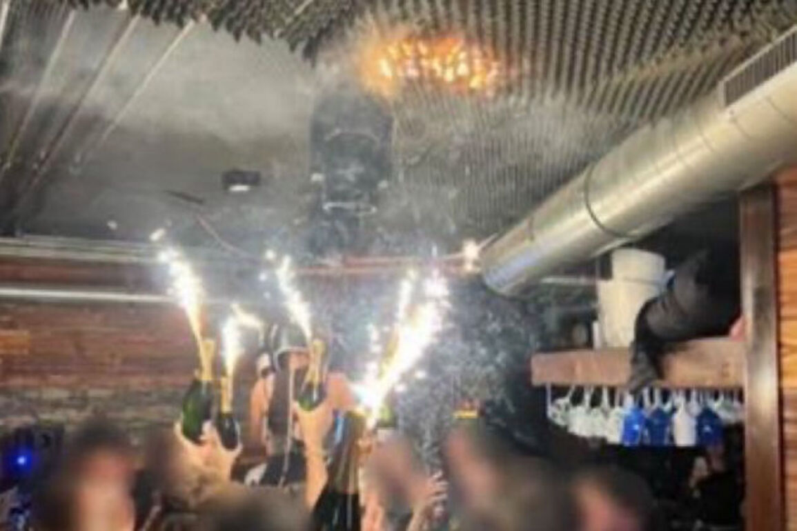 Sparkling candles placed on wine bottles set off fire at Swiss bar