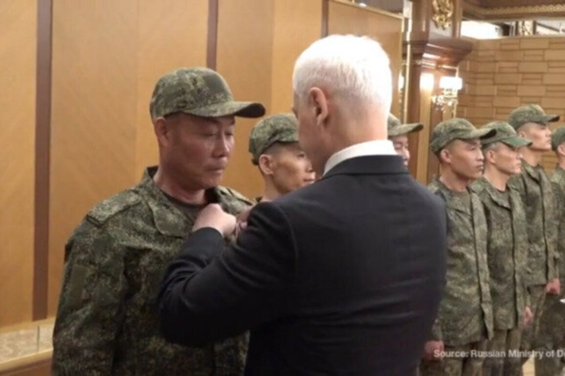 Russian defense minister decorates North Korean troops 