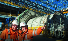 Workers at MMG's Las Bambas copper project in Peru