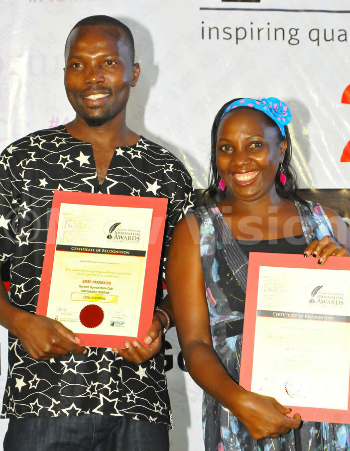  ew isions ope afaranga poses with her certificate of recognition