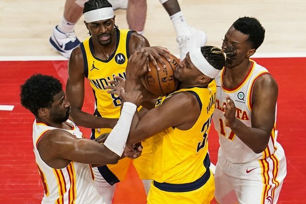 Injury-depleted Pacers host surging Hawks