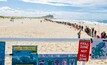 Protesters join hands in a moment of solidarity against seismic proposals. Image obtained Protect Our Coast Alliance. 