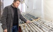 Brett Lynch inspects drill samples at the Moblan project