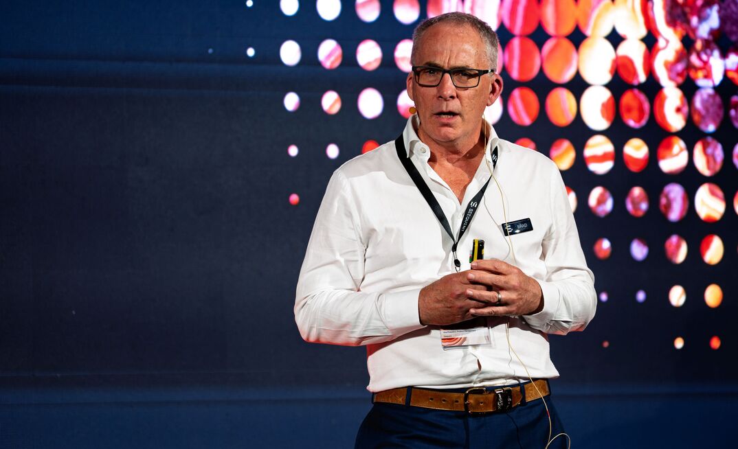 Brad Moore speaking at a recent Seequent Connect event in Perth.