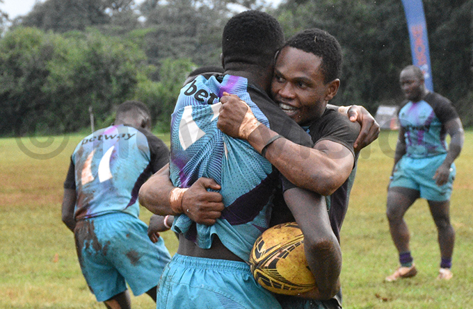 obs drian asiito celebrates a try with orbert kenyi hoto by ohnson ere
