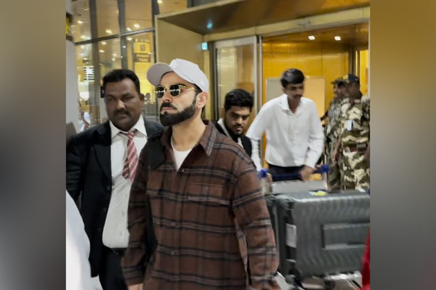 Virat Kohli spotted at Mumbai airport; playfully engages with paps, poses for photos