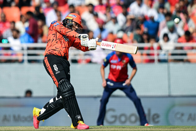 Down the track, in the 'V' position: Abhishek shows two technical powers during stroke-filled 74 against PBKS