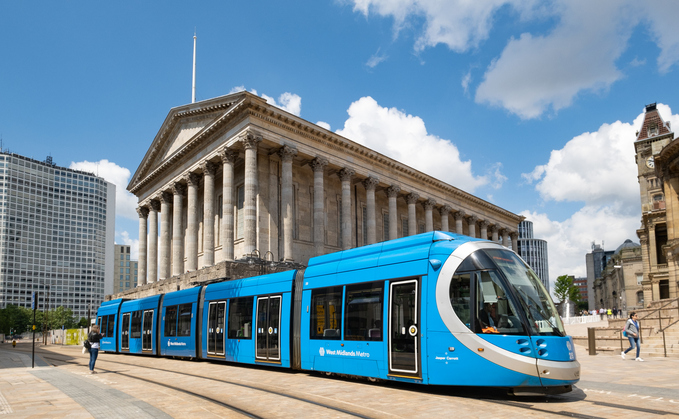 A blue West Midlands Metro tram at in front of Town Hall in Victoria Square, Birmingham | Credit: iStock