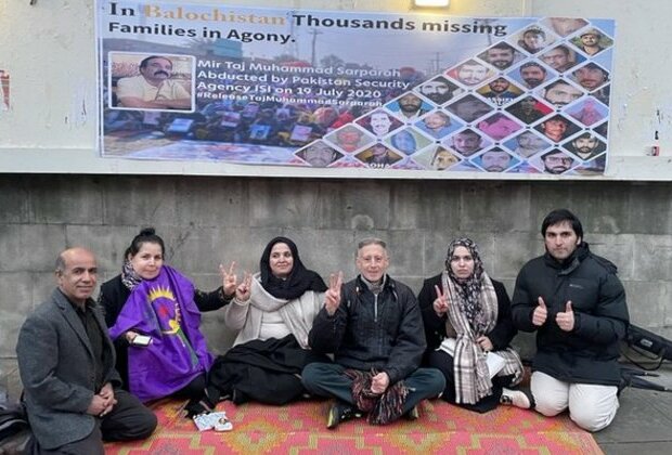 Sit-in protest outside UK PM's residence by kin of Taj Muhammad, abducted by Pak Army