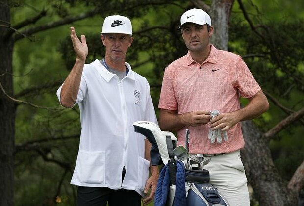 Scottie Scheffler's caddie ill, seen lying on ground at The Open