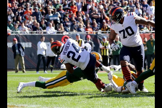 Rodgers again leads Packers by Bears