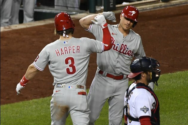 Harper leads Phillies to easy win over Nationals