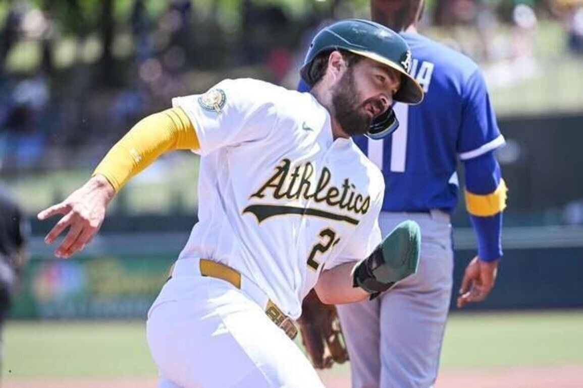 A's use timely hits, stellar bullpen to claim series win vs. Royals
