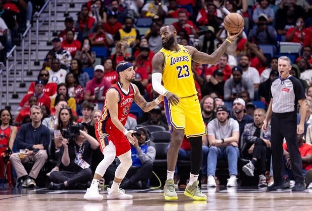 LeBron James, Lakers edge Pelicans, clinch playoff bid