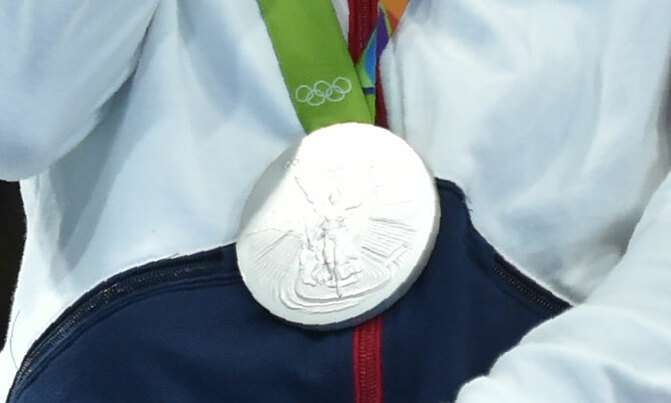 Olympian sells Rio medal to save boy battling cancer Olympian sells Rio medal to save boy battling cancer