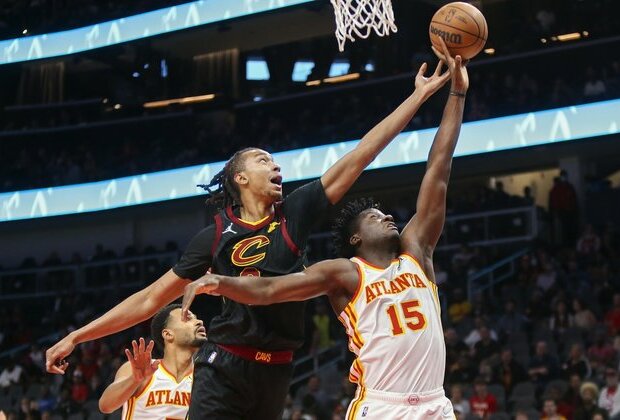 Hawks ease by Cavs to seal play-in berth