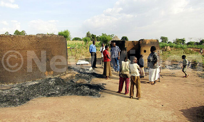 Fire forces families to sleep under trees Fire forces families to sleep under trees